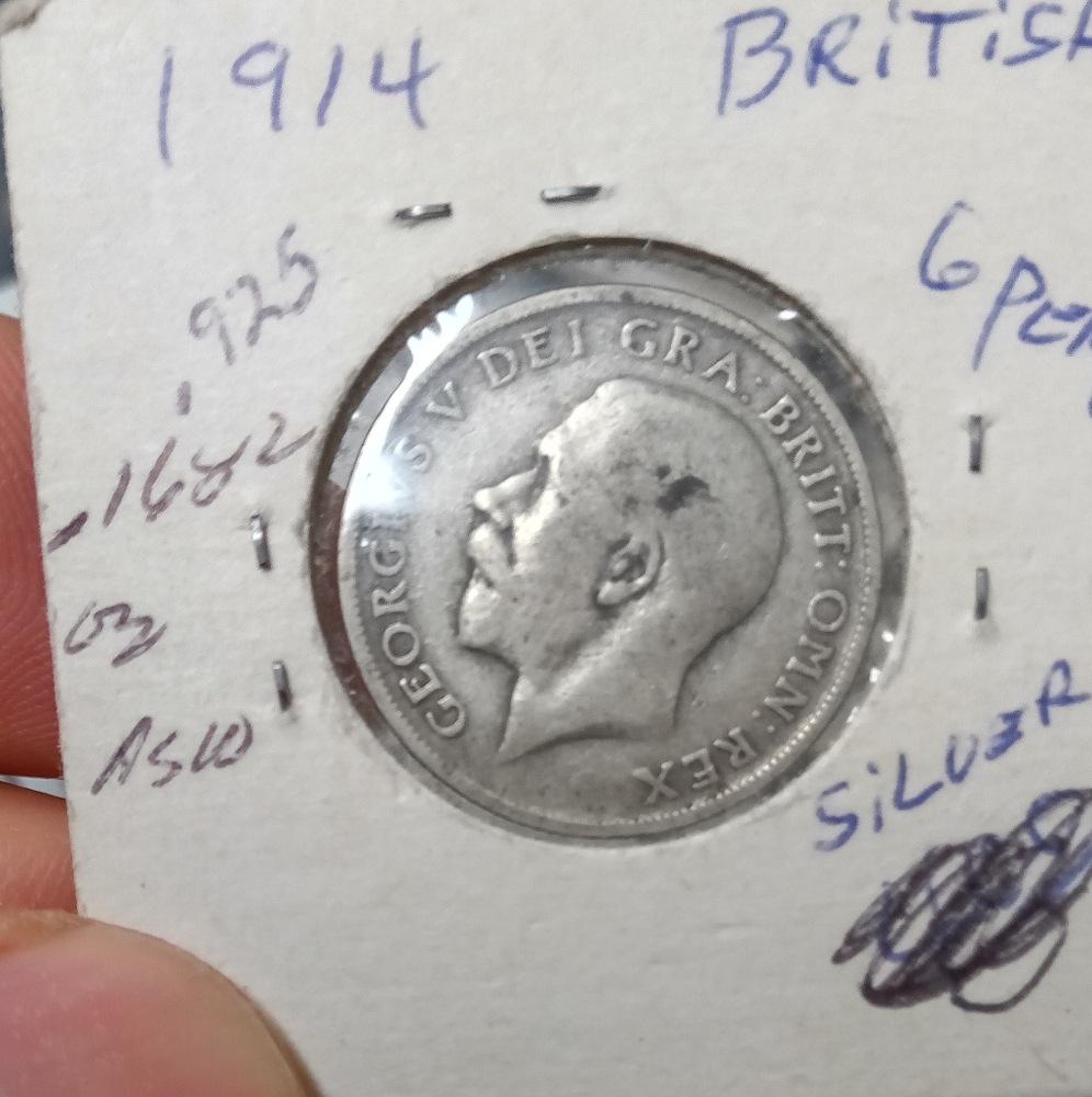 Silver Coin with Profile Design